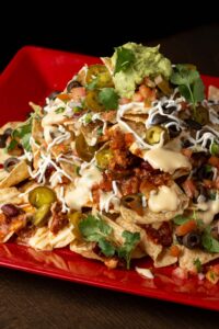 A huge plate of nachos from Planet Hollywood NYC