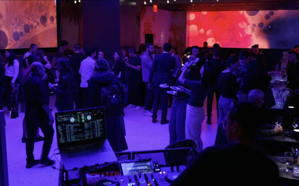 People mingilng and eating at an Influencer event at Planet Hollywood Ny York City